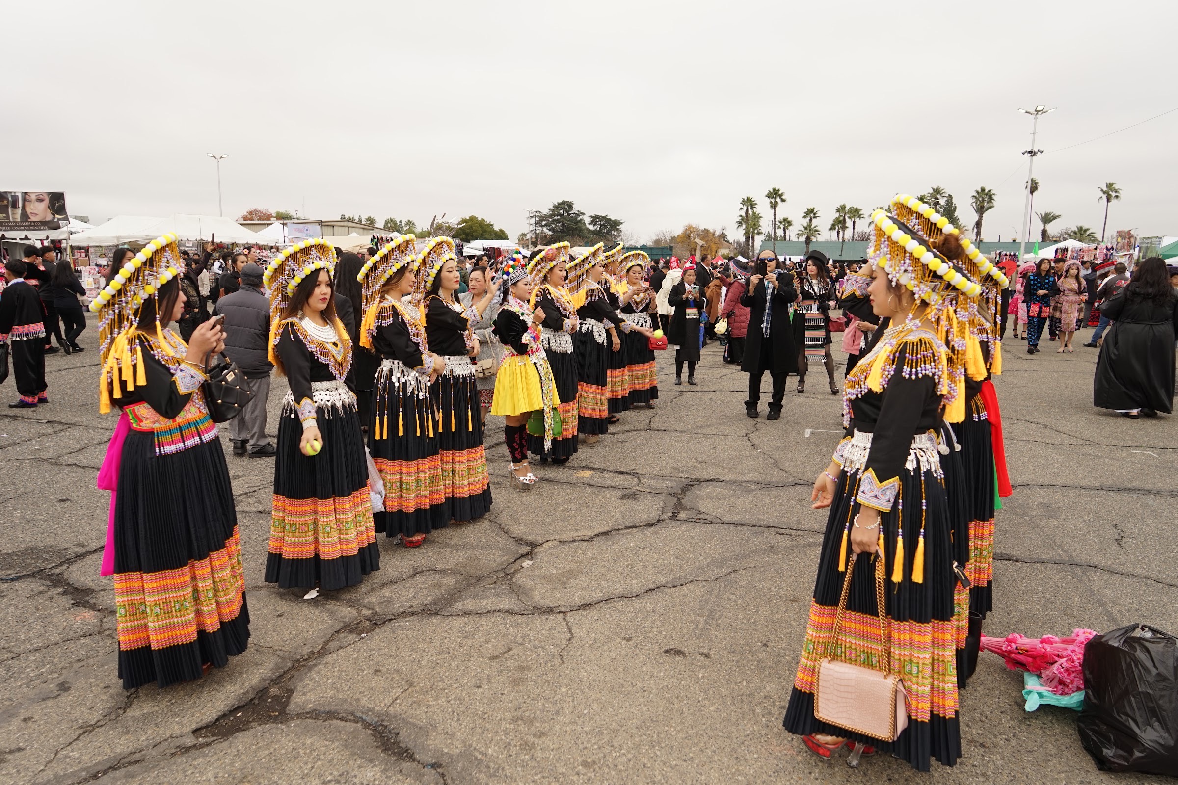 Dancers in full dress lined up before a performance.